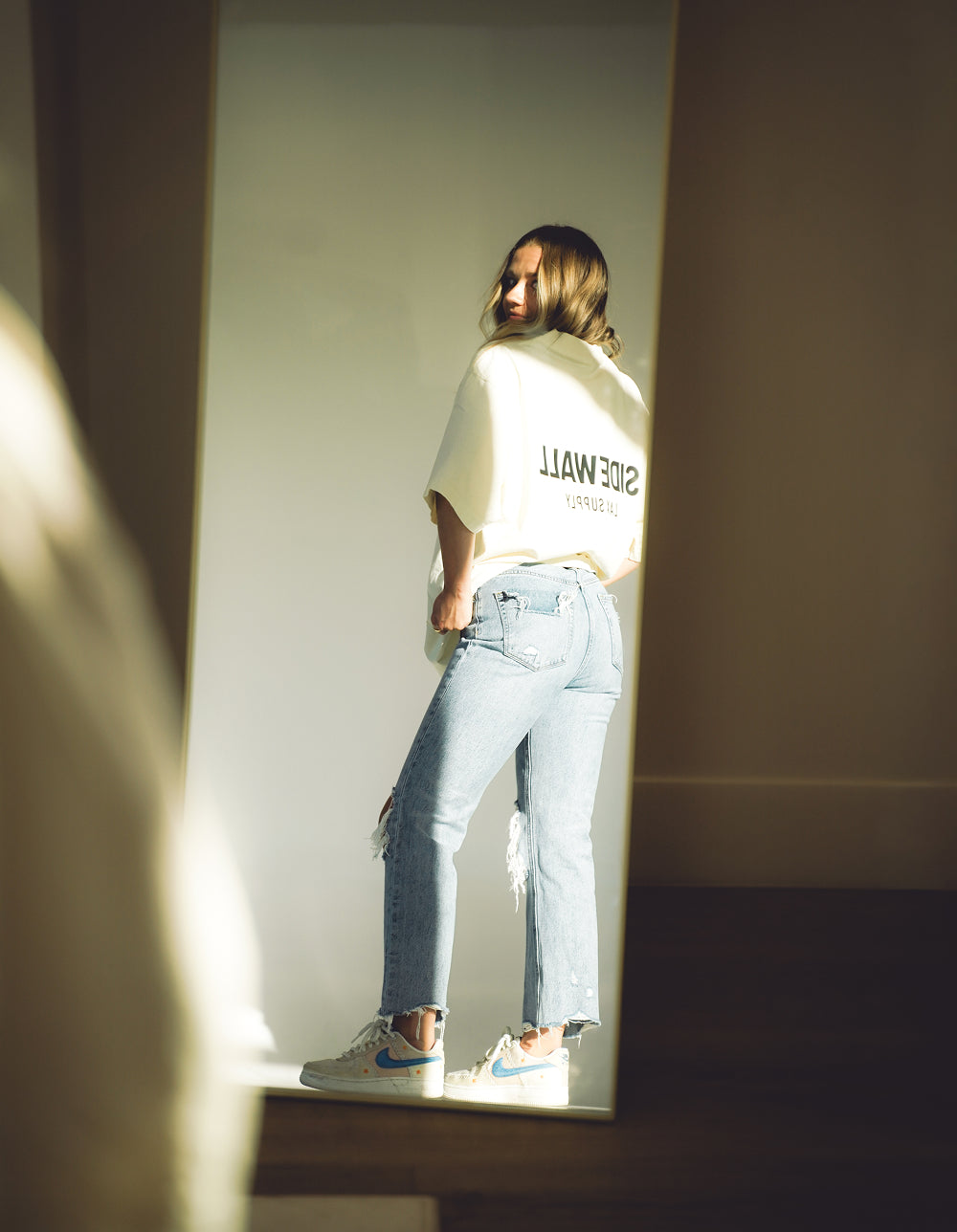 Sidewall Core bone lacrosse tee lifestyle photo