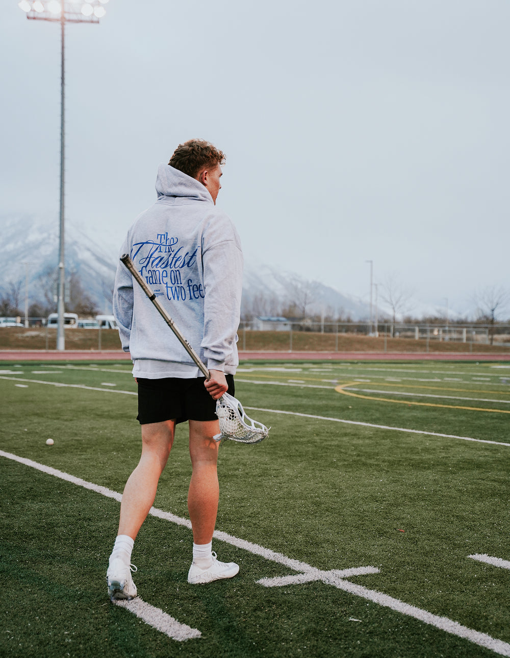 Fastest Game heather gray lacrosse hoodie back graphic lifestyle