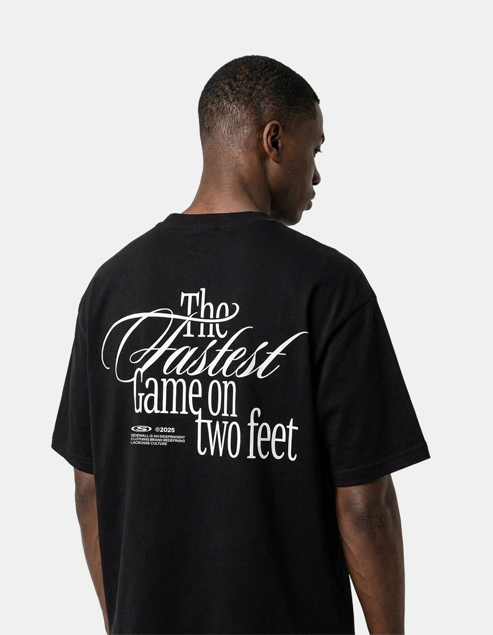 Fastest Game black oversized lacrosse tee back on model