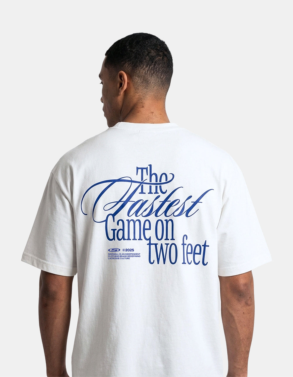 Fastest Game white oversized lacrosse tee back on model