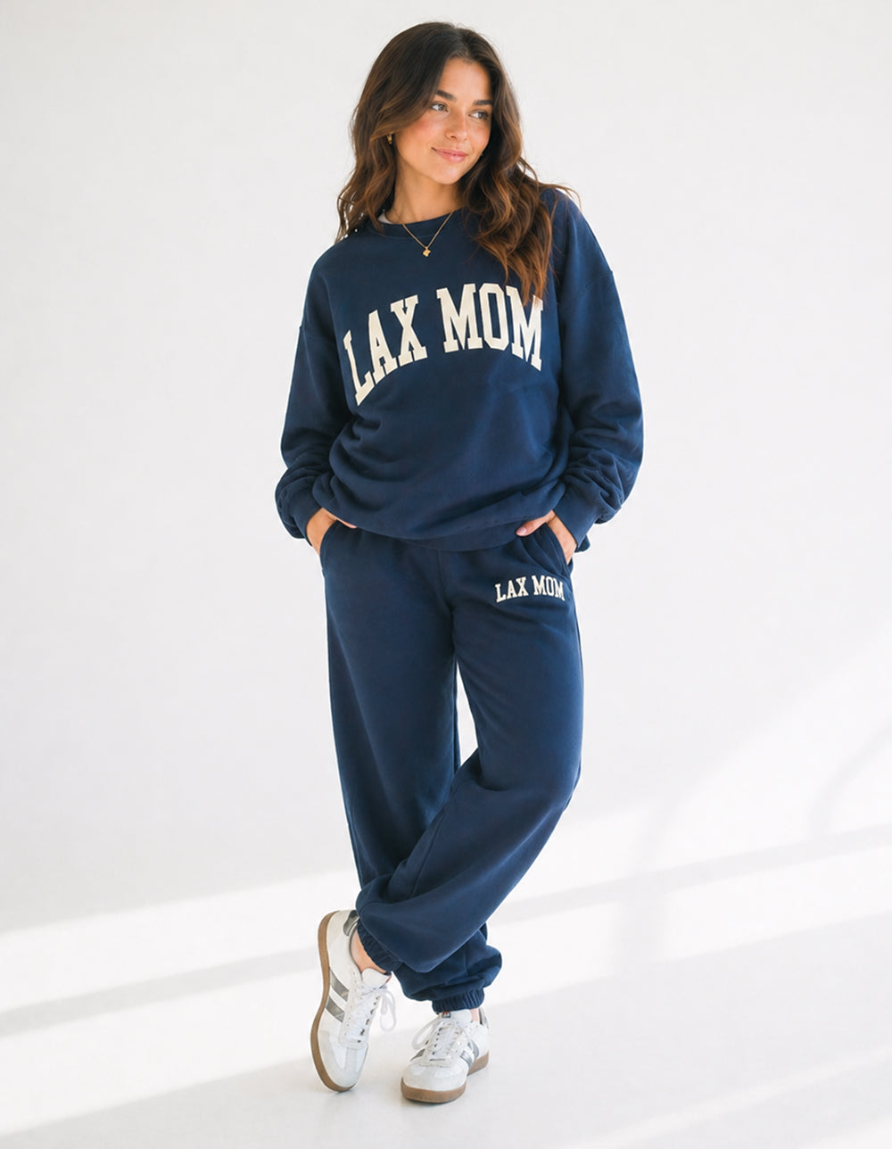 Lax Mom navy crewneck and sweatpants on model