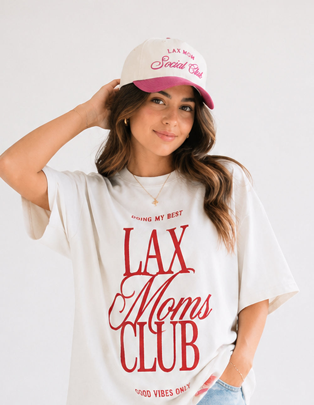 Lax Mom white and pink hat on model