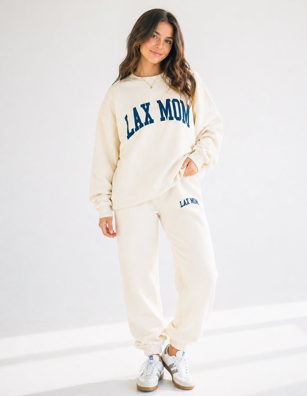 Lax Mom bone crewneck and sweatpants on model